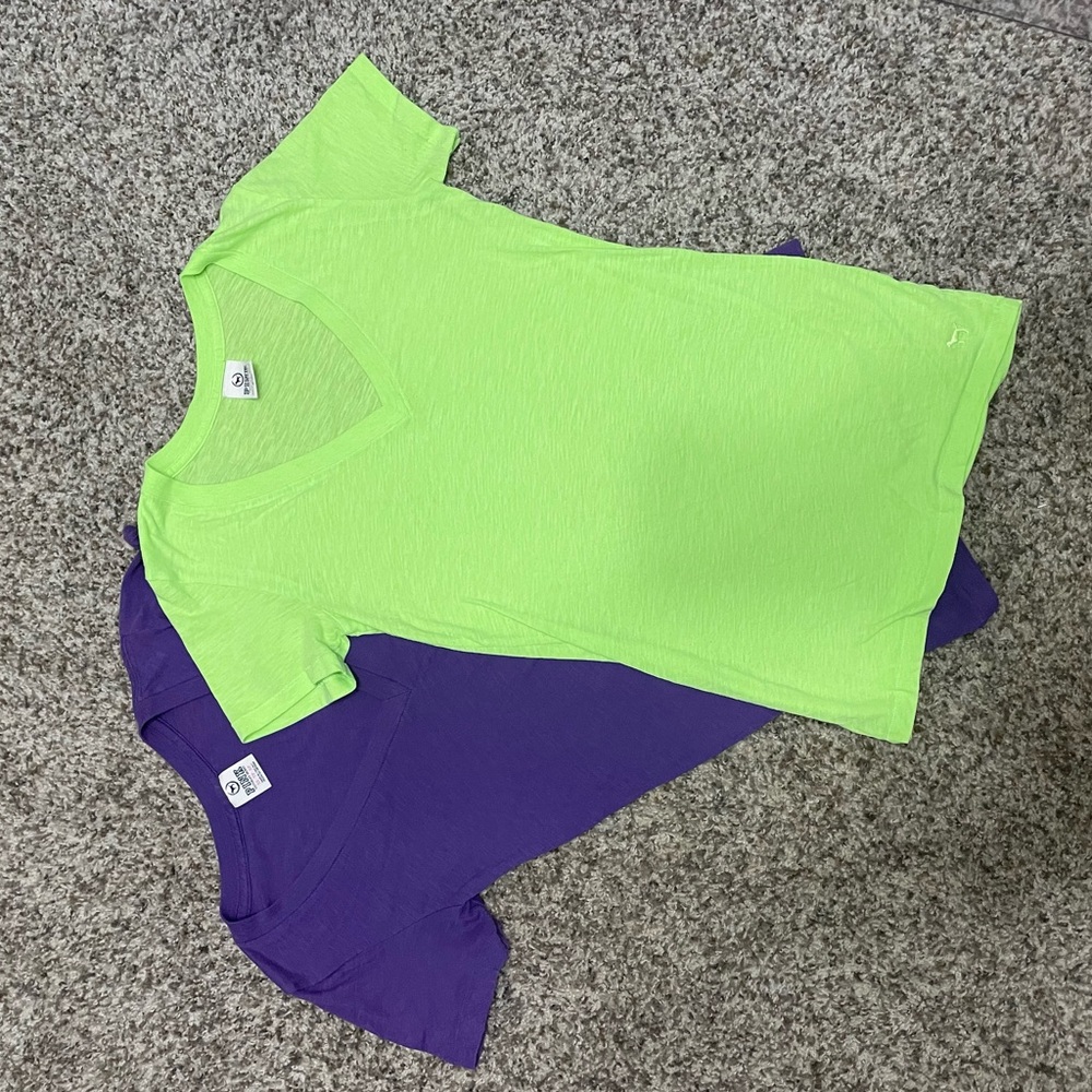 1 purple and 1 lime green PINK T-shirt. Size XS.
